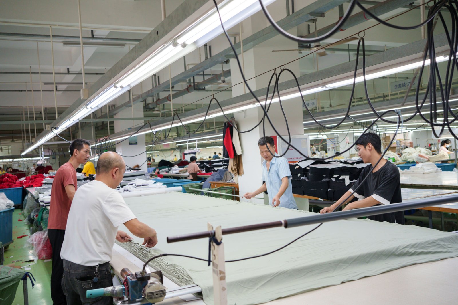 Cloth cutting worker in garment factory